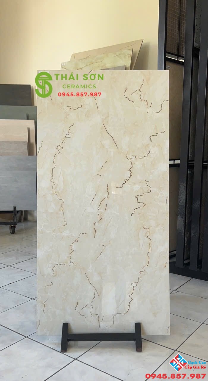 Gạch trung quốc 60x120 lát nền khắc kim màu vàng kem nhạt