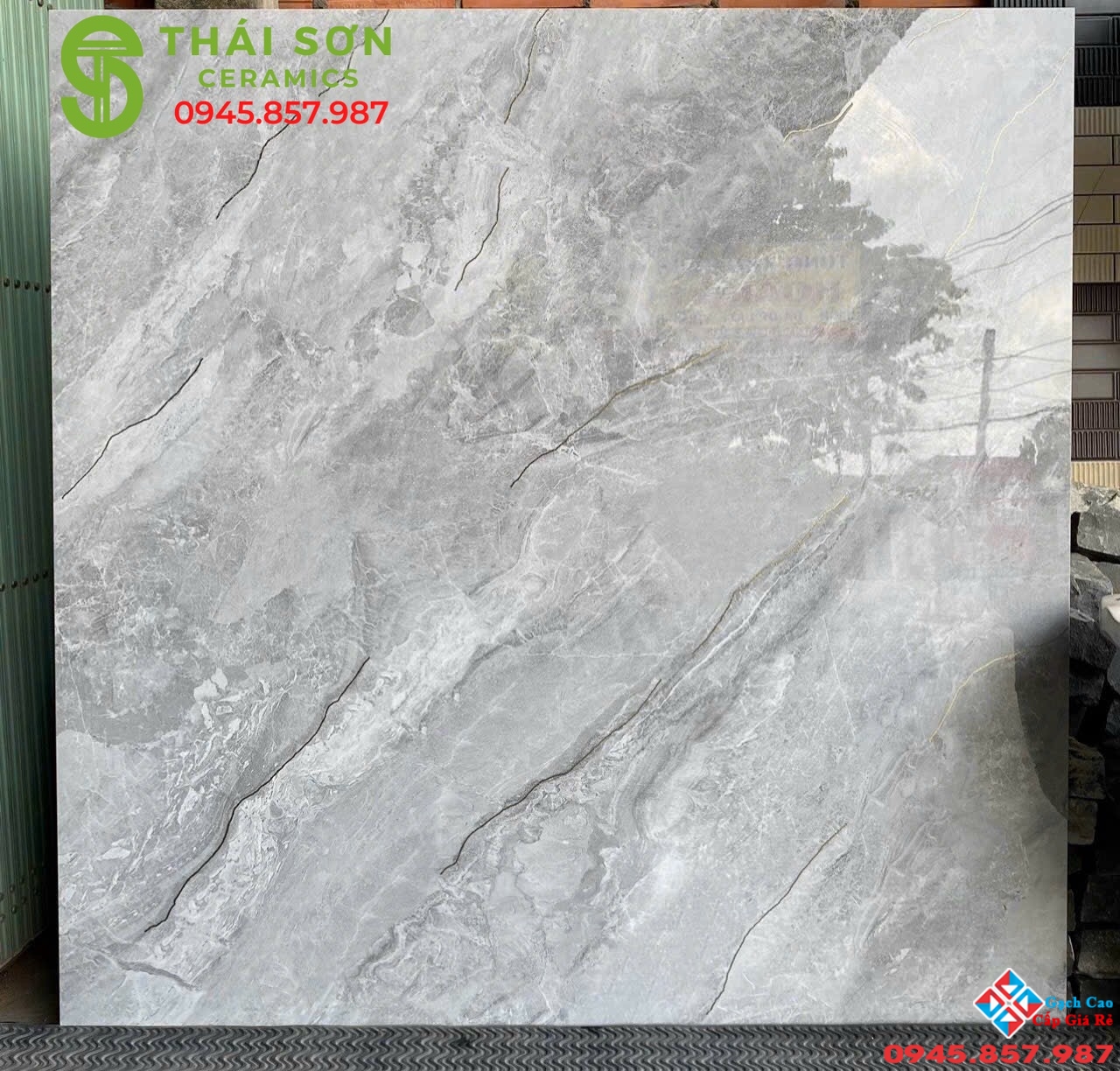 Gạch trung quốc 100x100 vân xám khắc kim cao cấp