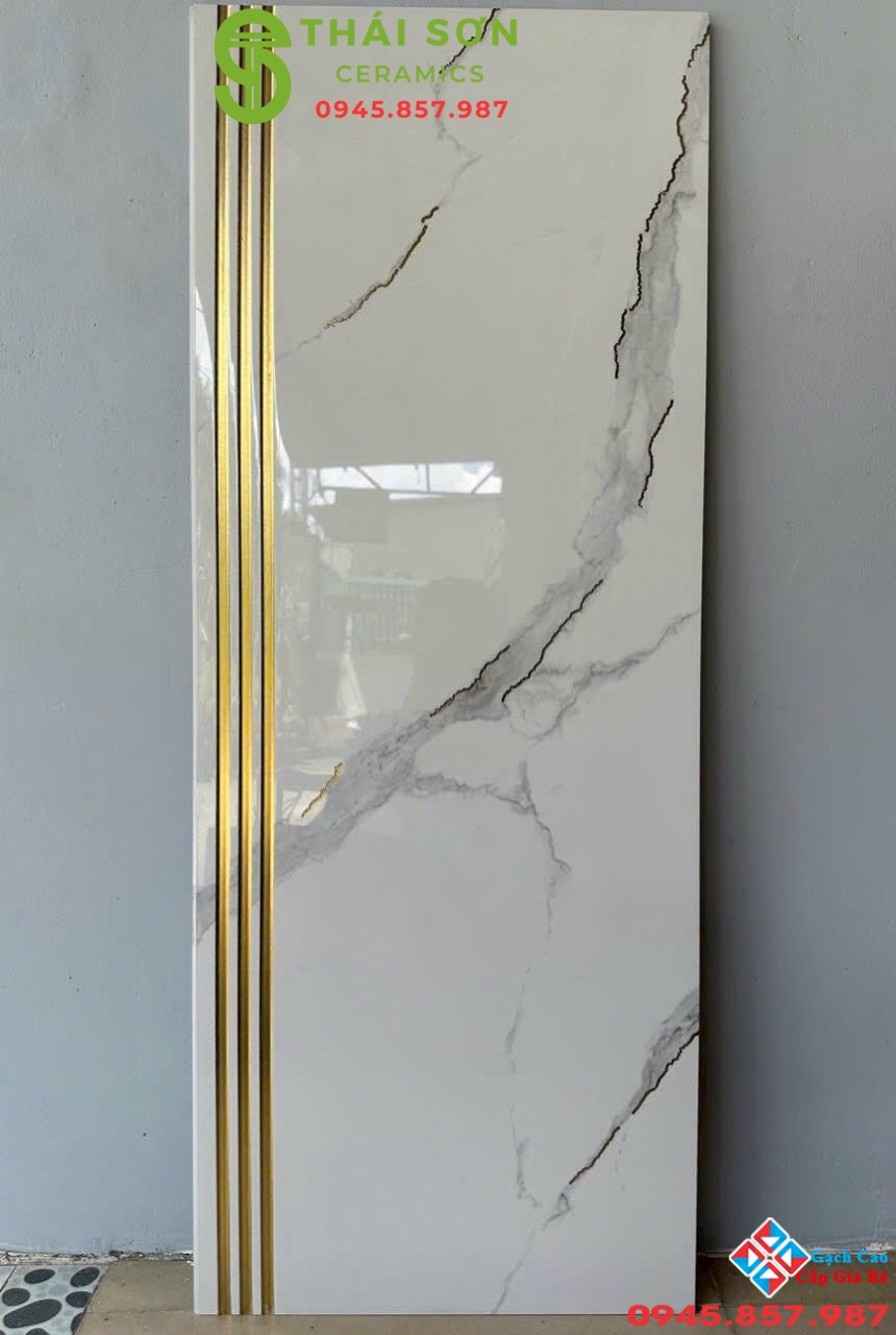 Gạch cầu thang 47x120 trung quốc màu trắng vân nhũ vàng 