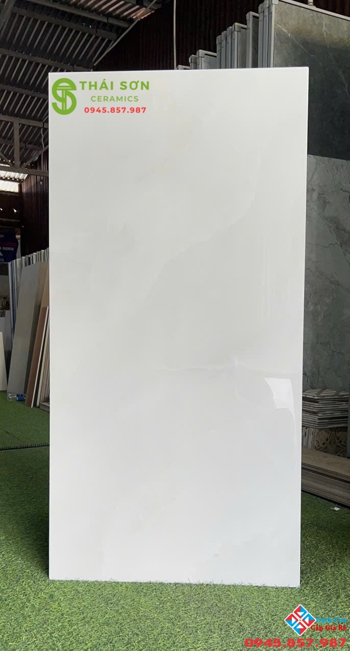 Gạch apodio siêu bóng 60x120 lát nền màu trắng xám vân đá