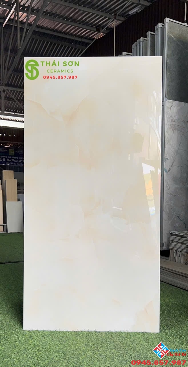 Gạch apodio siêu bóng 60x120 lát nền màu vàng kem ngọc trai