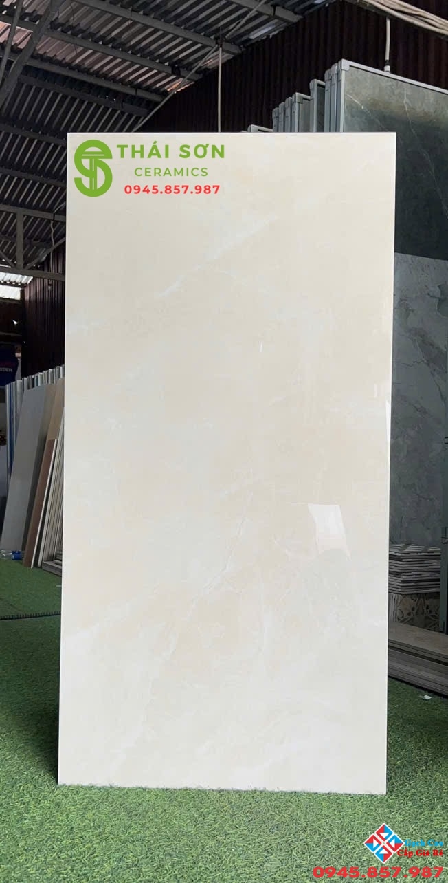 Gạch apodio siêu bóng 60x120 lát nền màu vàng kem nhạt
