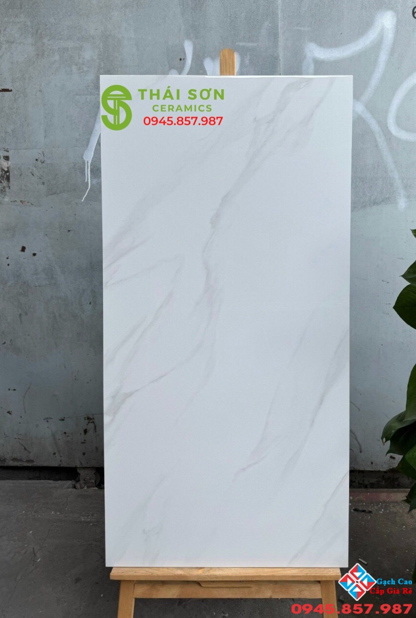 Gạch ốp tường phòng khách 60x120 bóng kiếng trắng vân