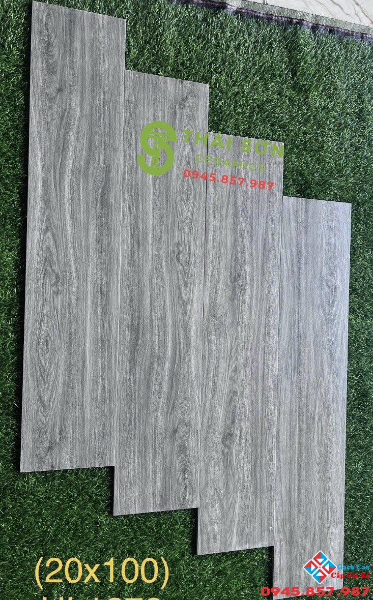 Gạch trung quốc 20x100 vân gỗ xám lát nền phòng khách