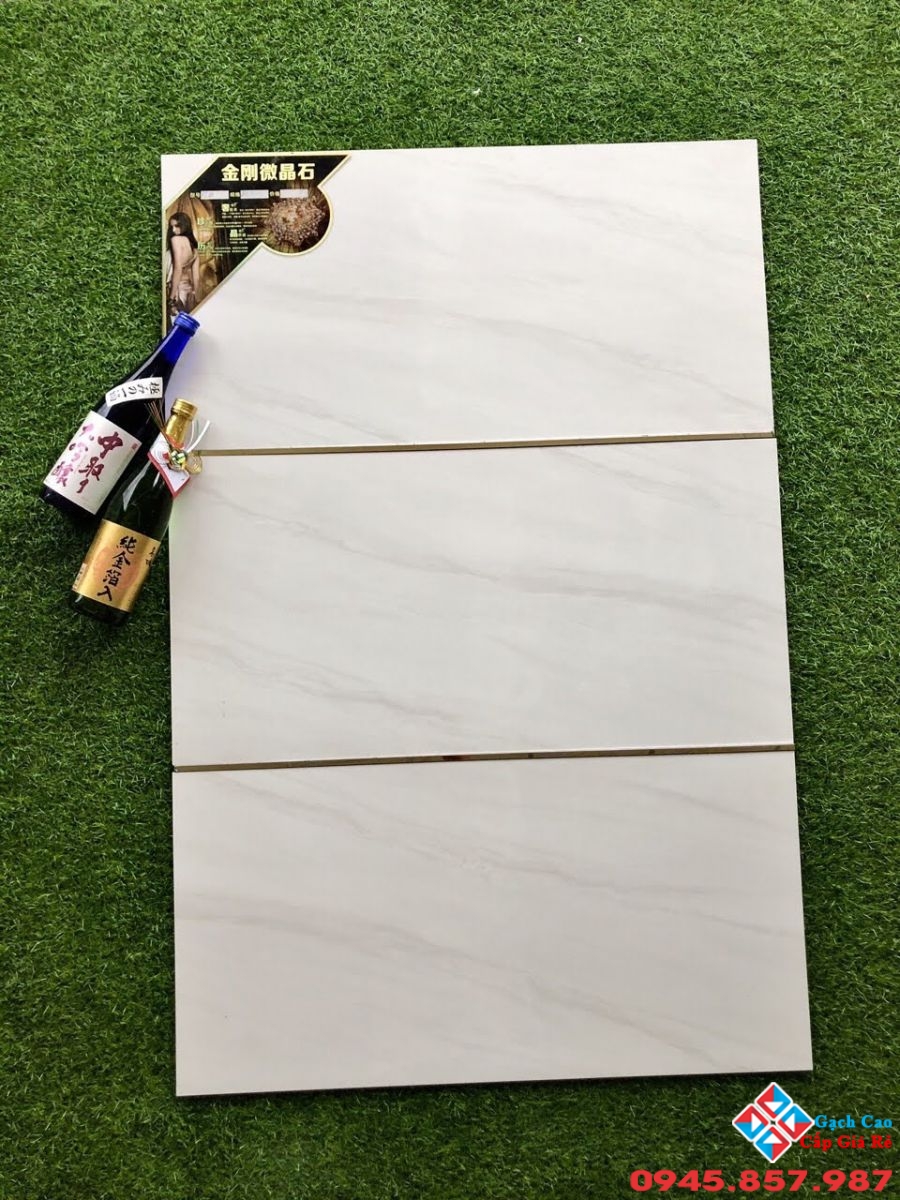đá bóng kiếng 40x80 trắng mây-1