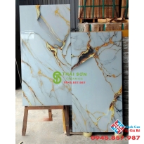 Gạch nền 60x120 ấn độ ánh vàng kim bóng kiếng mới nhất