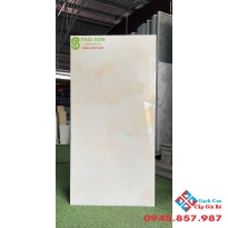 Gạch apodio siêu bóng 60x120 lát nền màu vàng kem ngọc trai