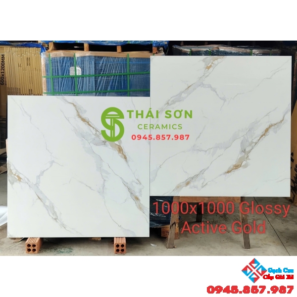 Gạch lát nền 100x100 ấn độ bóng kiếng trắng vân vàng kim