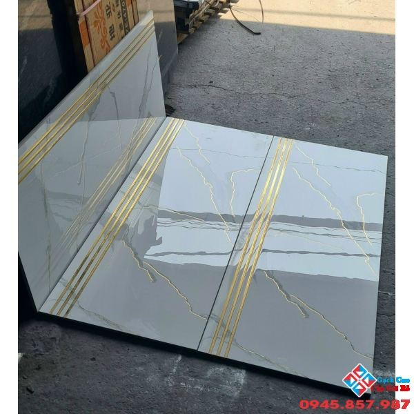 Gạch cầu thang tông trắng khắc kim cao cấp tại tphcm