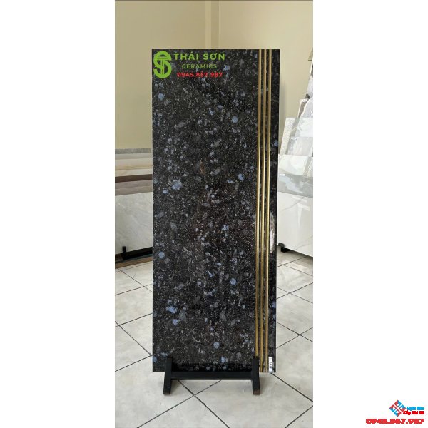 Gạch bậc cầu thang 47x120 trung quốc màu đen xà cừ ánh xanh