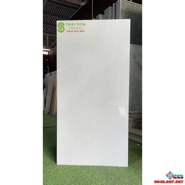 Gạch apodio siêu bóng 60x120 lát nền màu trắng xám vân đá