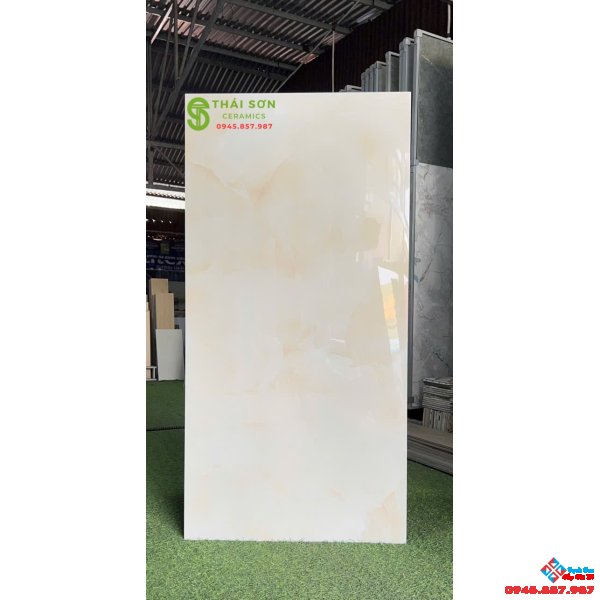 Gạch apodio siêu bóng 60x120 lát nền màu vàng kem ngọc trai