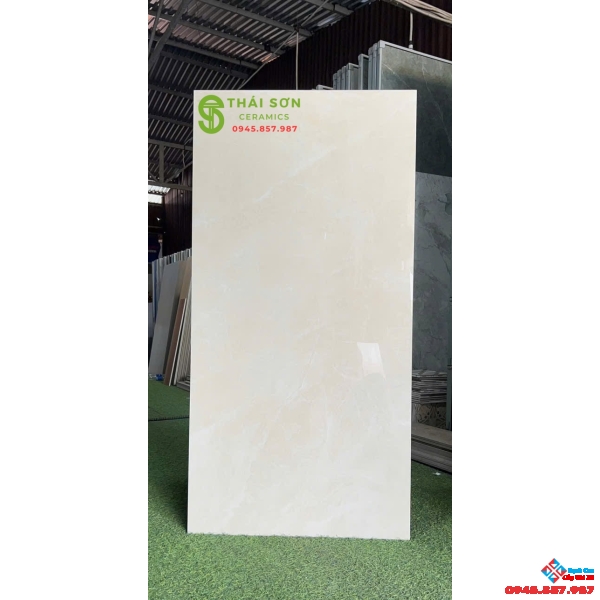 Gạch apodio siêu bóng 60x120 lát nền màu vàng kem nhạt