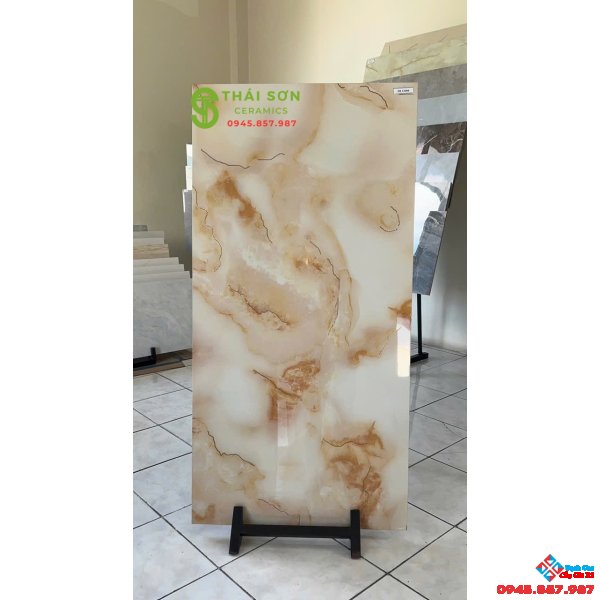 Gạch trung quốc 60x120 lát nền khắc kim màu vàng kem ngọc trai