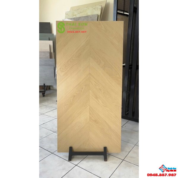 Gạch 60x120 trung quốc vân gỗ ghép xương cá màu vàng kem nhạt