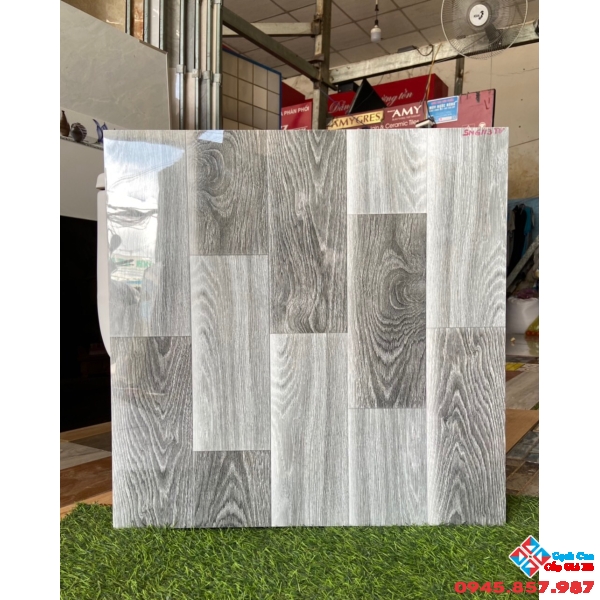 Đá bóng kiếng vân gỗ 60x60 lót nền nhà đẹp