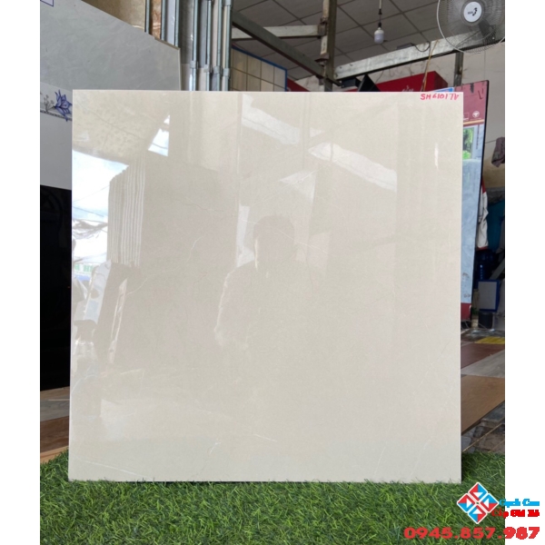 Gạch bóng kiếng giá rẻ đa phước 60x60 vân vàng nhẹ
