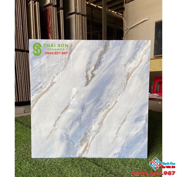 Mẫu gạch lát nền phòng khách nhà ống 60x60 bóng kiếng