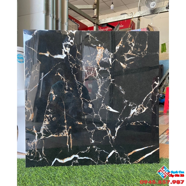 Gạch bóng kiếng 60x60 đen vân cam