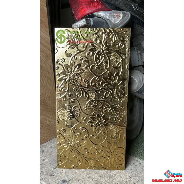 Gạch điểm 30x60 trung quốc mạ vàng ánh kim
