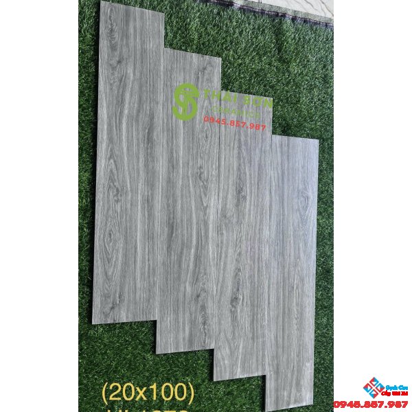 Gạch trung quốc 20x100 vân gỗ xám lát nền phòng khách