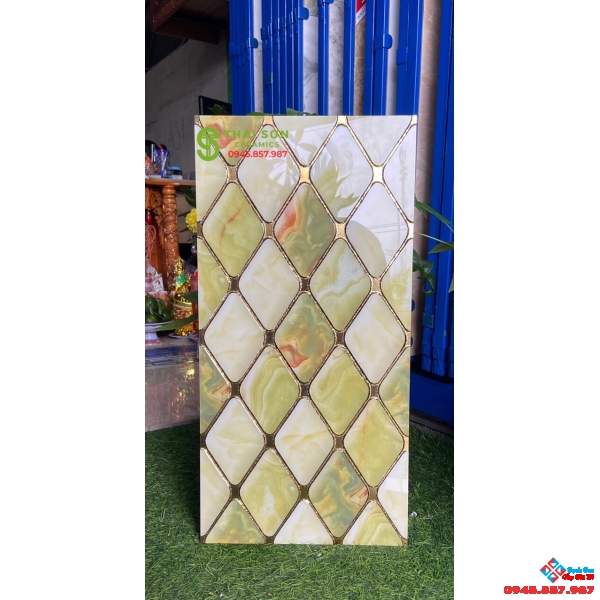 Gạch khắc kim vàng 30x60 trang trí cao cấp tại Q5